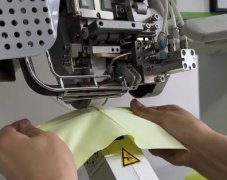 Seam sealing machine